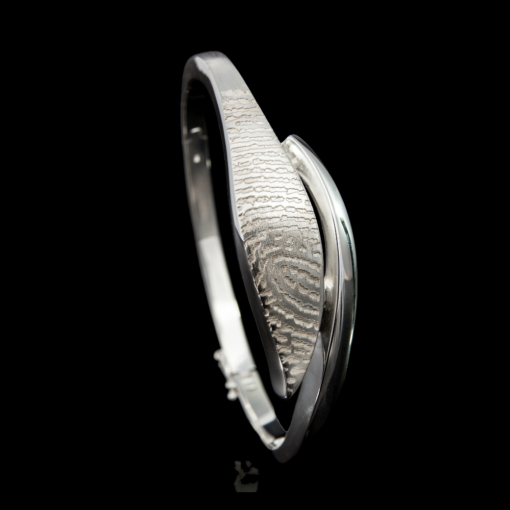design armband in zilver met vingerafdruk