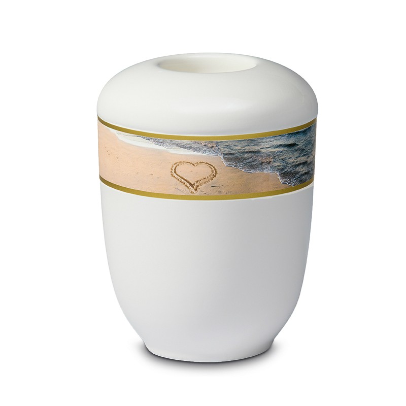 keramiek urn met waxine en hart op zand decorband
