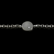Ronde hanger in zilver met gesloten askamer en Jasseron armband