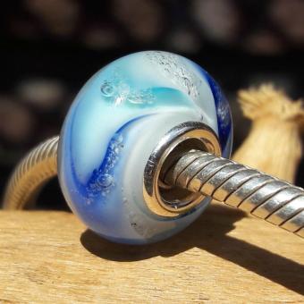 Bedel met deeltjes crematie-as: Atlantis