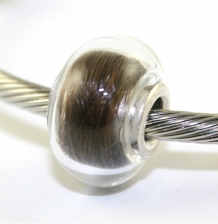 Haarlokbedel van transparant glas