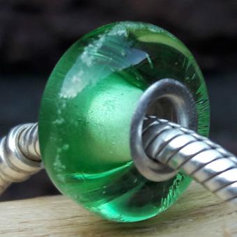 Bedel lichtgroen met deeltjes crematie-as