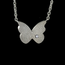Vlinder hanger in zilver met vingerafdruk + zirkonia