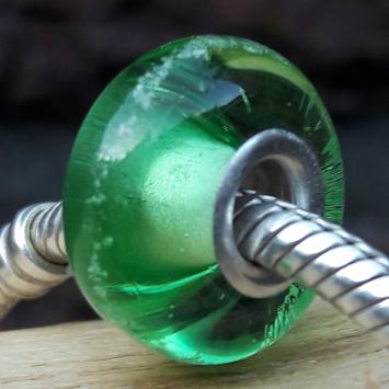 Bedel lichtgroen met deeltjes crematie-as